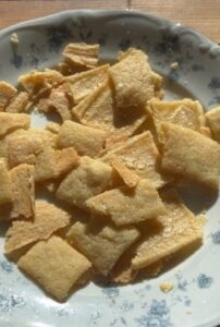 sourdough crackers on a decorative plate