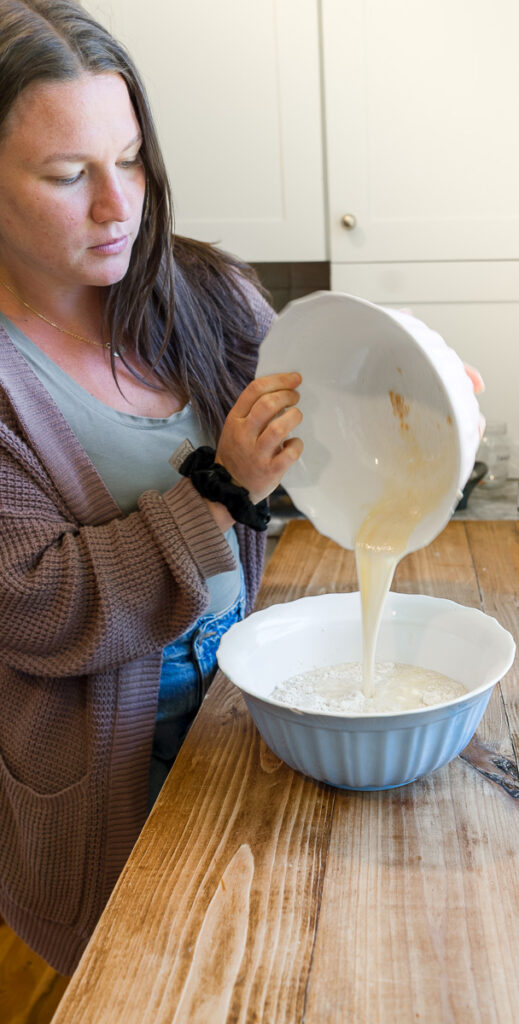 making homemade fresh-milled sourdough protein pancakes
