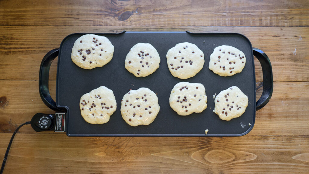 fresh-milled sourdough protein pancakes cooking on griddle